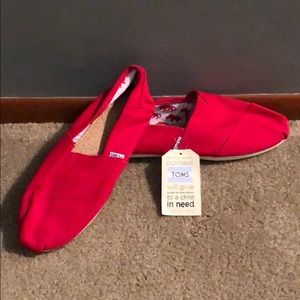 Men’s Toms shoes never worn